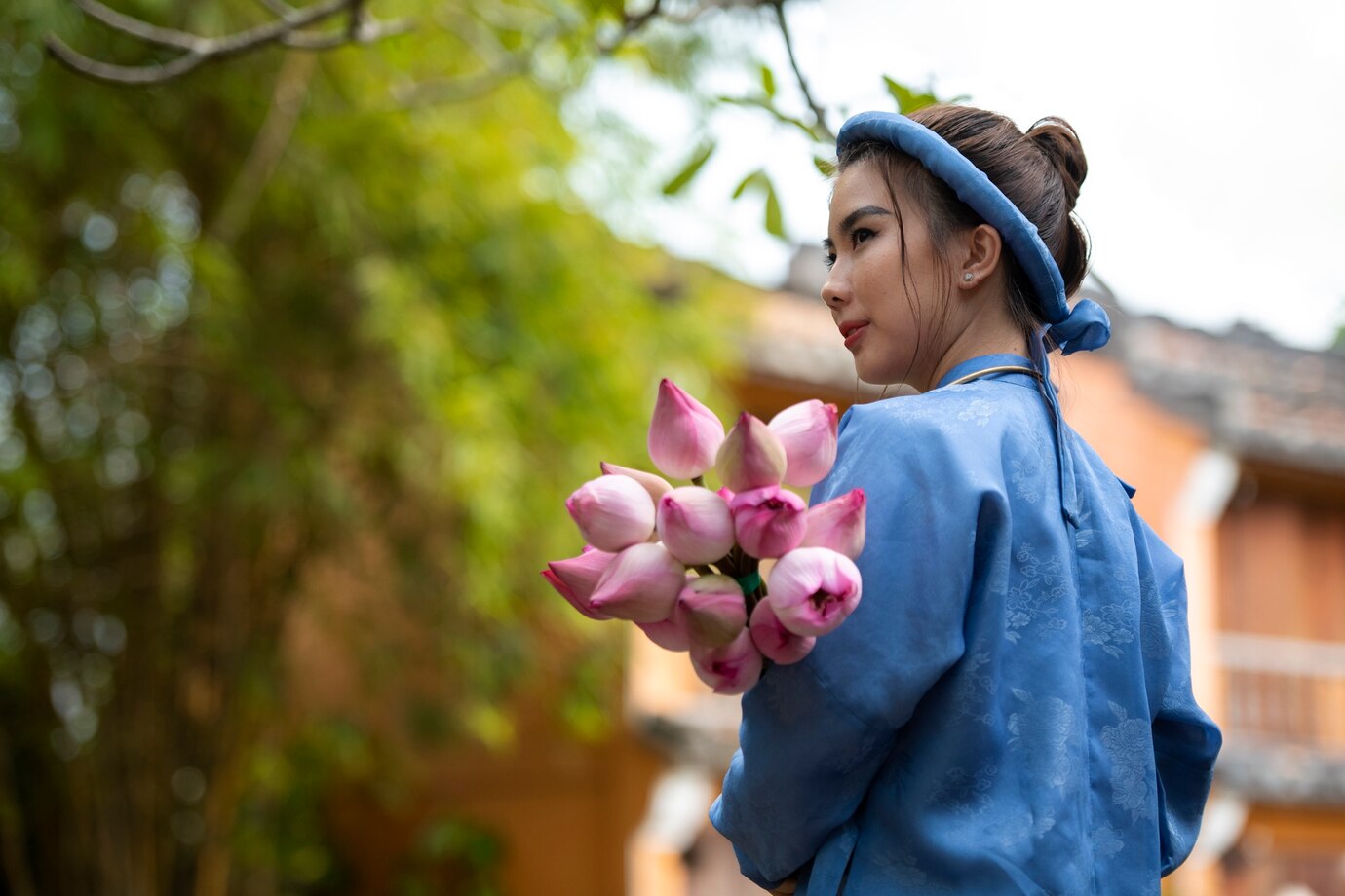 Young China woman with flower