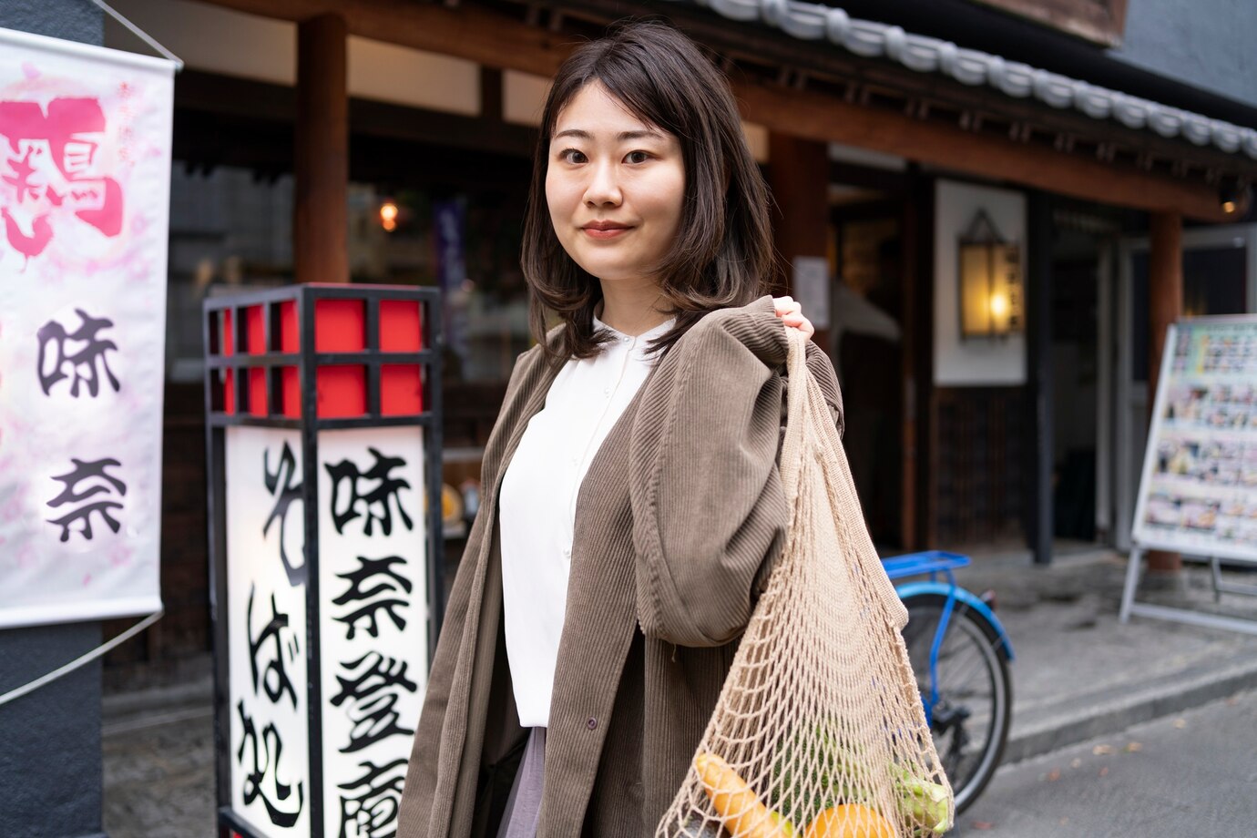 Japan woman carrying fabric bag