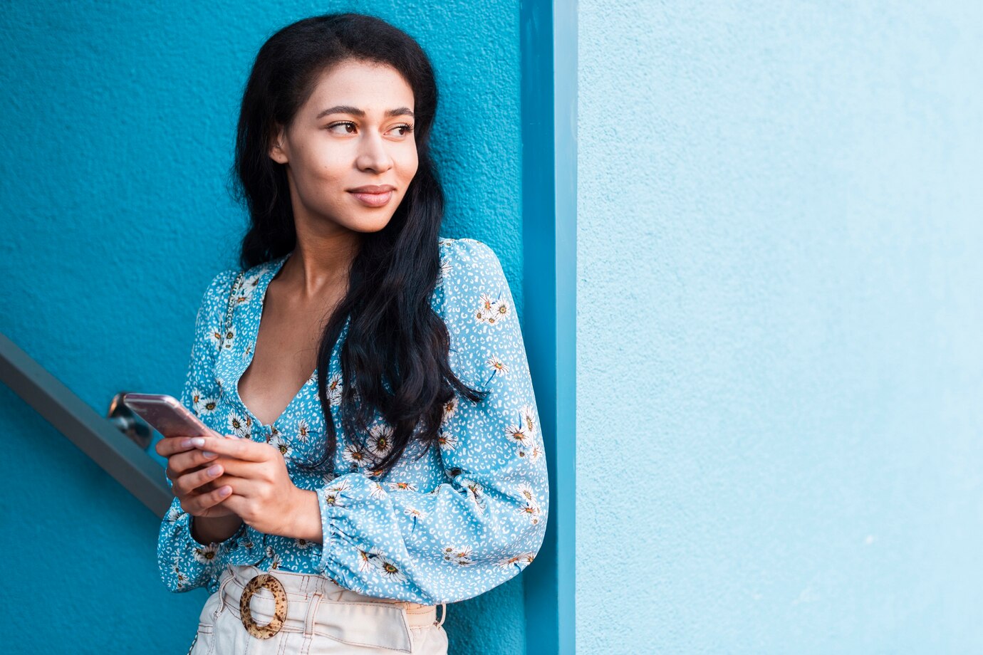 thai Woman holding her phone