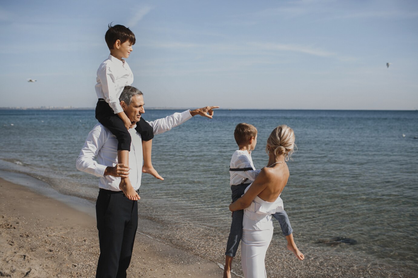 Beautiful family is looking on the breathtaking landscape