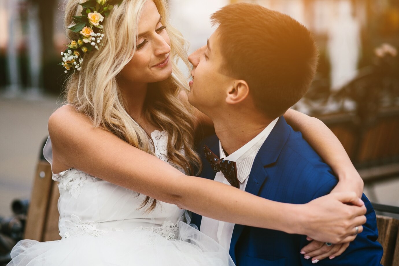 Bride looking at and hugging